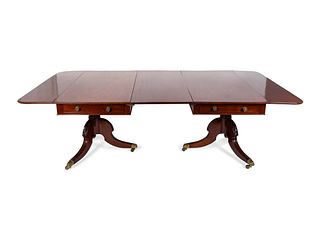 A Regency Style Mahogany Two-Pedestal Dining Table
Height 29 x width 94 x depth 53 1/2 inches.