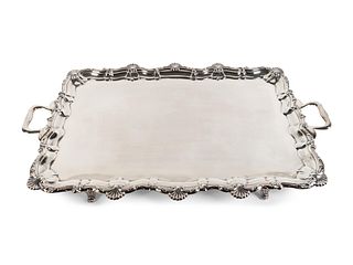 An English Silver Two-Handle Serving Tray
Length over handles, 33 5/8 x depth 19 inches.