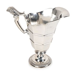 A French Neoclassical Style Silver Ewer
Height 9 inches.