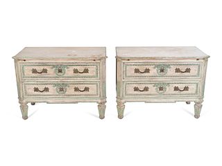 A Pair of Louis XVI Style Painted Commodes
Height 28 1/2 x width 38 1/2 x depth 20 1/2 inches.