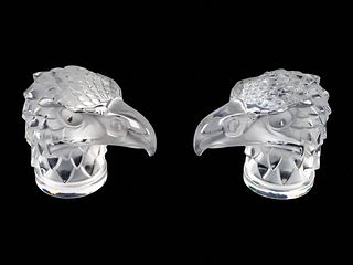 Two Lalique Glass Paperweights: Tete d'Aigle
Height 5 1/2 inches.