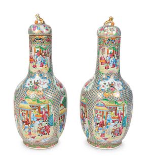 A Pair of Chinese Export Famille Rose Lidded Jars
Height 25 inches.