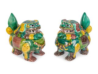 A Pair of Chinese Sancai Glazed Porcelain Mythical Beast-Form Incense Burners
Height 7 1/2 x width 8 3/4 inches.