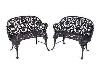 A Pair of Victorian Style Cast-Iron Garden Benches
Height 36 x width 37 inches.
