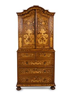 A Dutch Baroque Style Marquetry Cabinet
Height 82 1/2 x width 36 1/2 x depth 24 1/2 inches.
