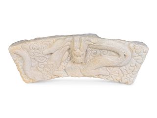 A Continental Carved Marble Arch Fragment
Height 12 1/2 x length 34 x depth 5 inches.