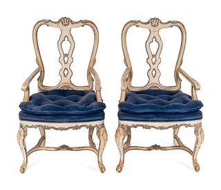 A Set of Four Italian Rococo Style Carved and Painted Armchairs
Height 42 x width 22 x depth 18 inches.