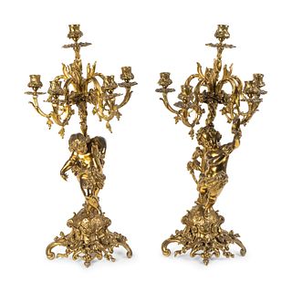 A Pair of Rococo Style Brass Figural Candelabra
Height 25 inches.