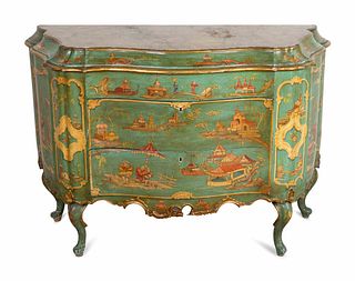 A Venetian Rococo Style Polychromed Bombe Commode
Height 35 1/2 x length 52 x depth 24 inches.