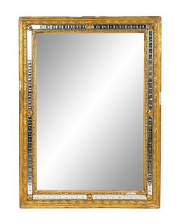 A Neoclassical Style Giltwood Rectangular Mirror
48 x 35 inches.