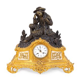 A French Parcel-Gilt, Patinated Bronze and Alabaster Figural Mantel Clock
Height 17 1/2 x width 18 inches.