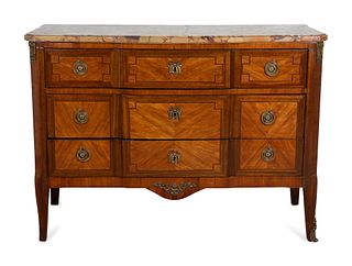 A Louis XV/XVI Transitional Style Kingwood and Tulipwood Commode
Height 33 1/2 x length 46 x depth 19 1/2 inches.