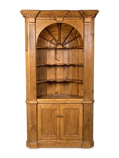 A George III Style Carved Pine Corner Cupboard
Height 89 x width 45 x depth 19 inches.