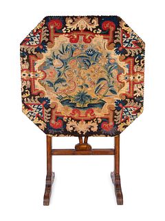 A Victorian Needlepoint-Mounted Tilt-Top Coaching Table
Height 42 x width 28 x depth 28 inches.