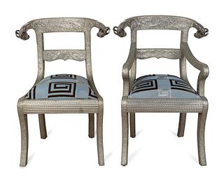 A Set of Eight Anglo-Indian Silvered Metal-Clad Dining Chairs
Height 35 x width 22 x depth 21 inches.