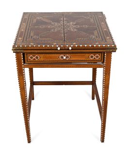 A Syrian Mother-of-Pearl, Bone and Fruitwood Parquetry Game Table/Desk 
Height 29 1/2 x width 23 x depth 23 inches.