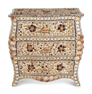 A Contemporary Shell-Encrusted Chest of Drawers
Height 37 inches.