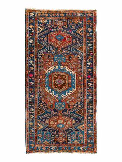 A Mousel Wool Rug
6 feet 7 inches x 3 feet 7 inches.