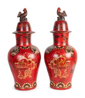 A Pair of Chinese Polychromed Ceramic Covered Jars
Height 30 x diameter 12 inches.