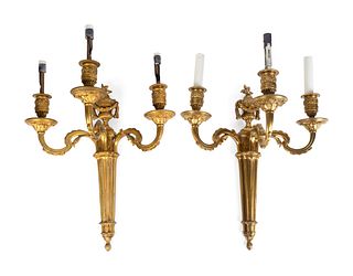 A Pair Louis XVI Style Bronze Three-Light Sconces
Height 17 x width 14 1/2 inches.