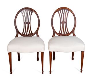 A Set of Six George III Carved Mahogany Dining Chairs and Two Similar Upholstered Back Armchairs
Height of side chairs 37 x width 21 1/2 inches.