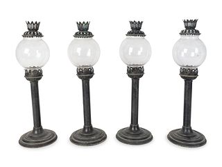 A Set of Four English Tole and Glass Hurricane Candlesticks
Height 16 inches.