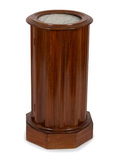 A Continental Mahogany Fluted Cylindrical Pedestal Cupboard
Height 28 1/2 x diameter 15 inches.