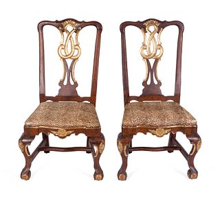 A Pair of Portuguese Rococo Parcel-Gilt Walnut Side Chairs
Height 36 inches.