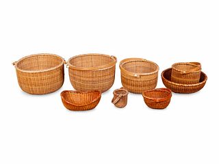 Eight Nantucket Baskets and a Small Oval Bowl Heights 3 1/4 to 11 1/4 inches. Length of bowl 8 x width 6 inches.