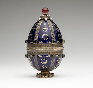 A vermeil and enamel Faberge-style Easter egg
