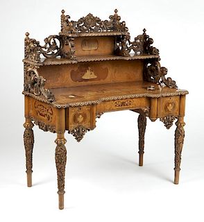 German ornately carved and marquetry inlaid desk