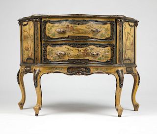 A Venetian-style carved and polychromed commode