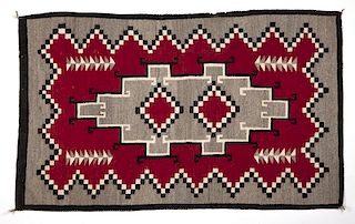 A Navajo hand-woven regional rug