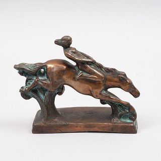Amazona. Fundición en bronce patinado. Con base rectangular. 15 cm de altura