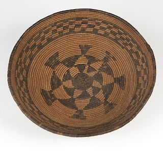 An Apache coiled basketry deep tray