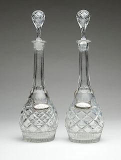 A pair of English cut glass decanters