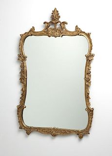 A Continental carved and giltwood wall mirror