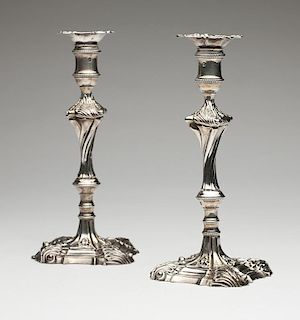 A pair of George III sterling silver candlesticks