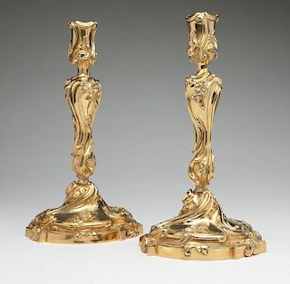 A pair of louis XV-style gilt-bronze candlesticks