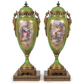 A Pair of Porcelain Urns in Green with Ormolu Mounts