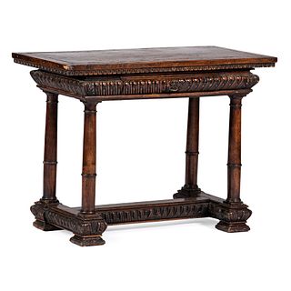 An Italian Carved and Inlaid Walnut Writing Table