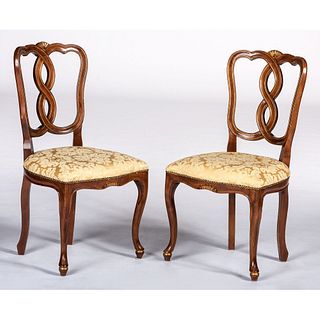 A Pair of Italian Parcel Gilt Walnut Side Chairs