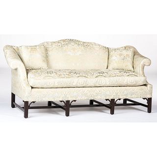 A George III-style Mahogany Camelback Sofa