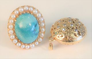 Two piece lot to include; one 14 Karat Gold Ring set with cabochon cut turquoise, surrounded by pearls, 13 grams total weight, along with one herb lo