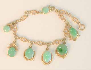 14K and Green Jade Bracelet
total weight 20.1 grams
Provenance: Estate of Dr. Thomas & Alice Kugelman, Bloomfield, Connecticut