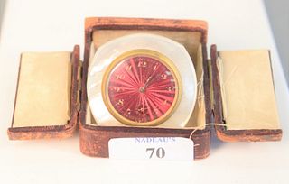 Didisheim Goldschmidt Fils Swiss Clock
having red enameled face, and mother of pearl frame
marked on back in leather fitted case