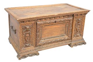 Walnut Cassone
17th or 18th Century
having lift top and carved faces, panels and snipe hinges
height 20 1/2 inches, width 43 inches