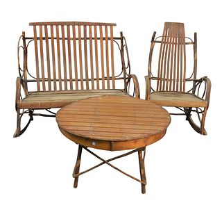 Four piece Adirondack Style Set
to include double rocker, length 44 1/2 inches;
two tables, and rocker
two marked Amish Adventures, Pennsylvania
Prove