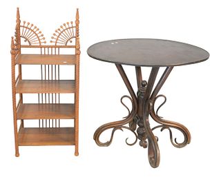 Two Piece Lot to Include Bentwood Round Center Table
along with a stick and ball four-tier shelf
height 30 inches, diameter 33 inches
Provenance: Thir
