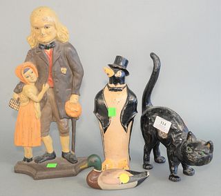 Four piece group of iron doorstops including a penguin, cat, duck, and colonial family man with child marked C.N., highest height 14 1/2 inches 
Prove